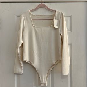 A new day long sleeve bodysuit